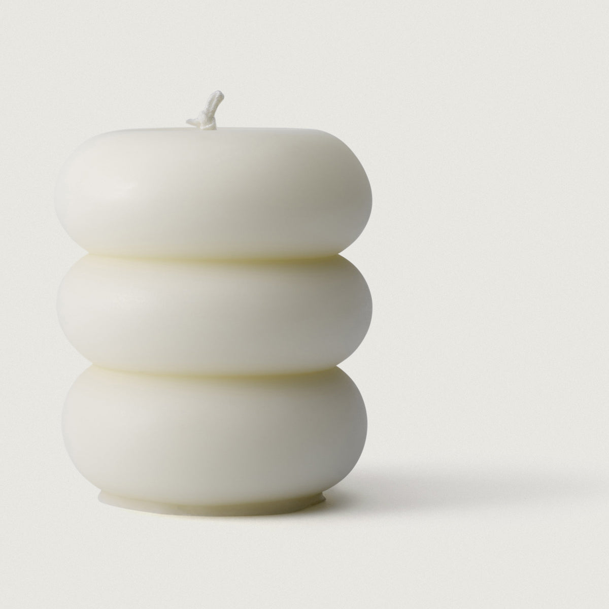 LLIOR Pillar Candle I, a three tier sculptural candle in beeswax and soy, unscented