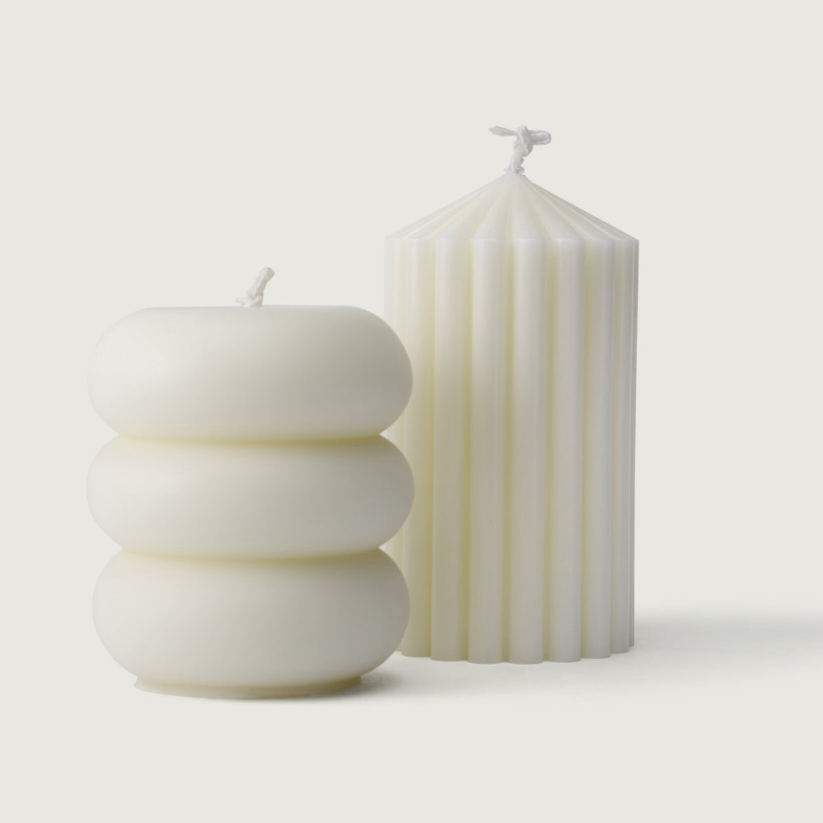 LLIOR Pillar Candle Set: Pillar I and Pillar II, two unscented pillar candles in beeswax and soy wax