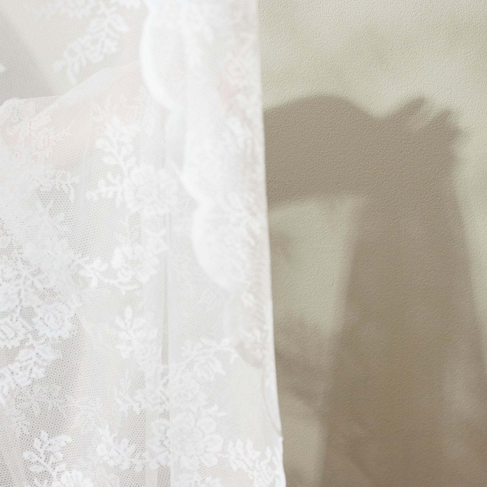Soft lace curtain with candle shadow warm light LLIOR