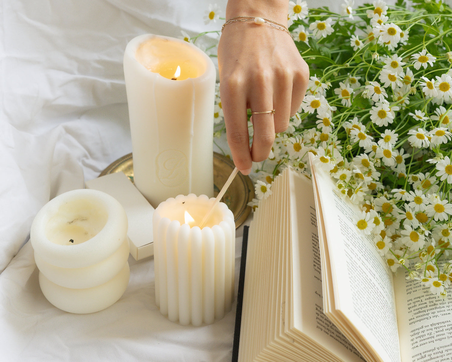 LLIOR Edition No 01 Summer pillar candles warm flame with flowers and book