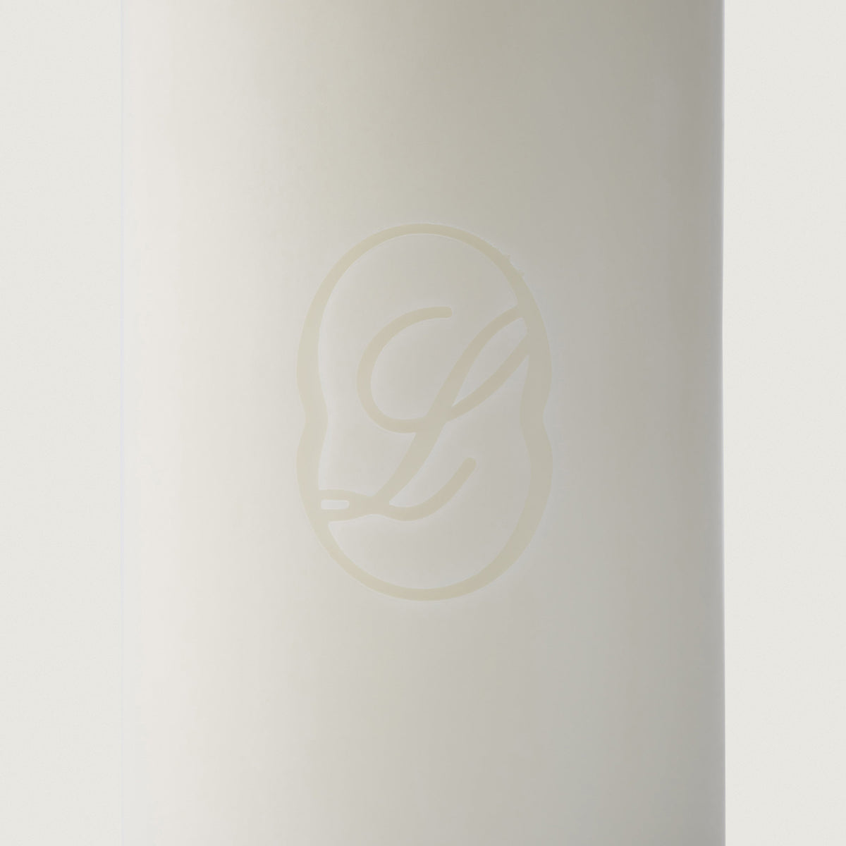 Close up of the LLIOR monogram pressed into the wax of the Signature Candle