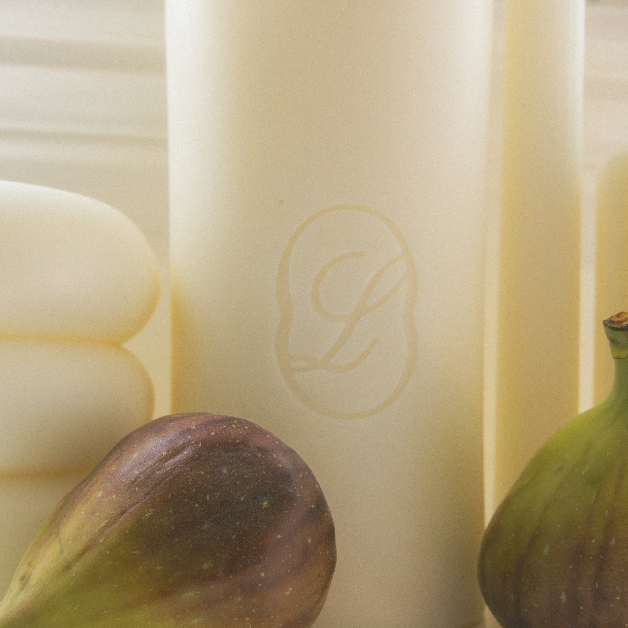 LLIOR logo pressed into wax signature candle beeswax soy luxury pillar candle Netherlands