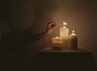LLIOR luxury candle being lit warm flame natural wax Netherlands